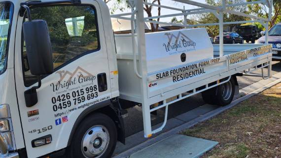Wright Group vehicle signage displayed on the truck.