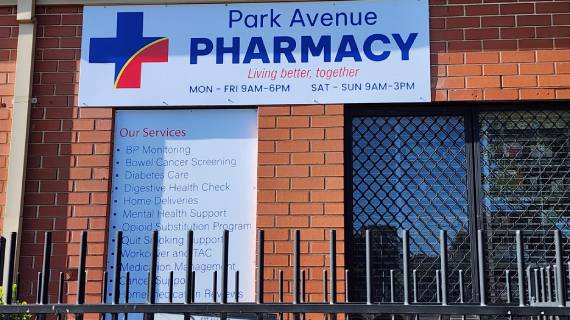 Park Avenue Pharmacy shopfront signage is displayed outside the store.